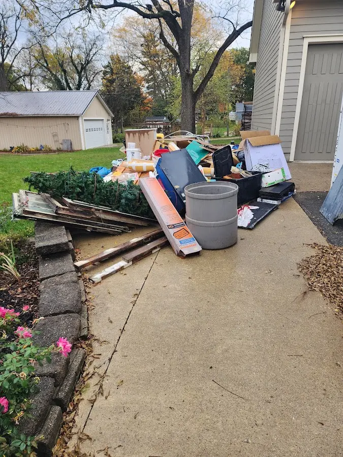 Dumpster being loaded with debris for Residential Dumpster Rental in Florida City